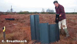 Blocking a drain on Lodge Bog, Co. KIldare with Plastic Lumbar 